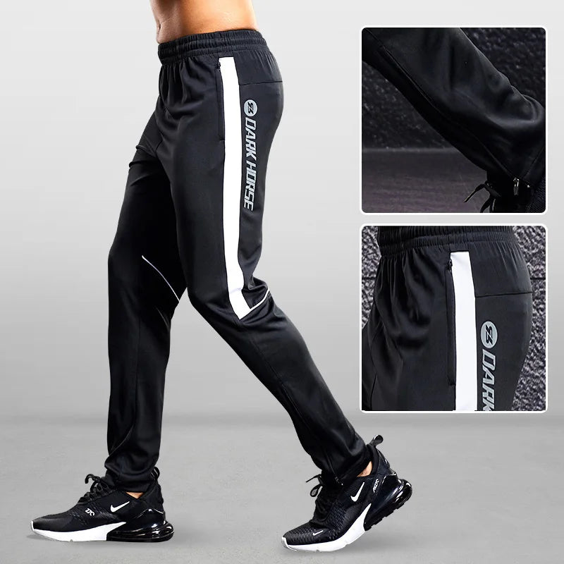 Tapered training pants waistband and drawstring detail