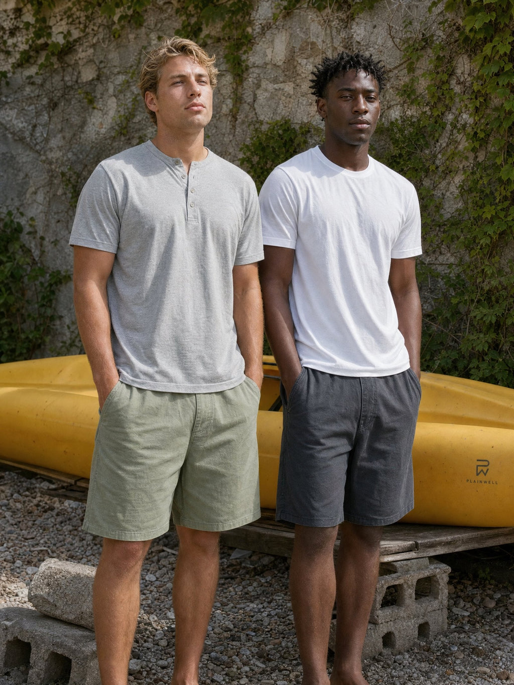 Sage chino short worn with a grey henley by a kayak
