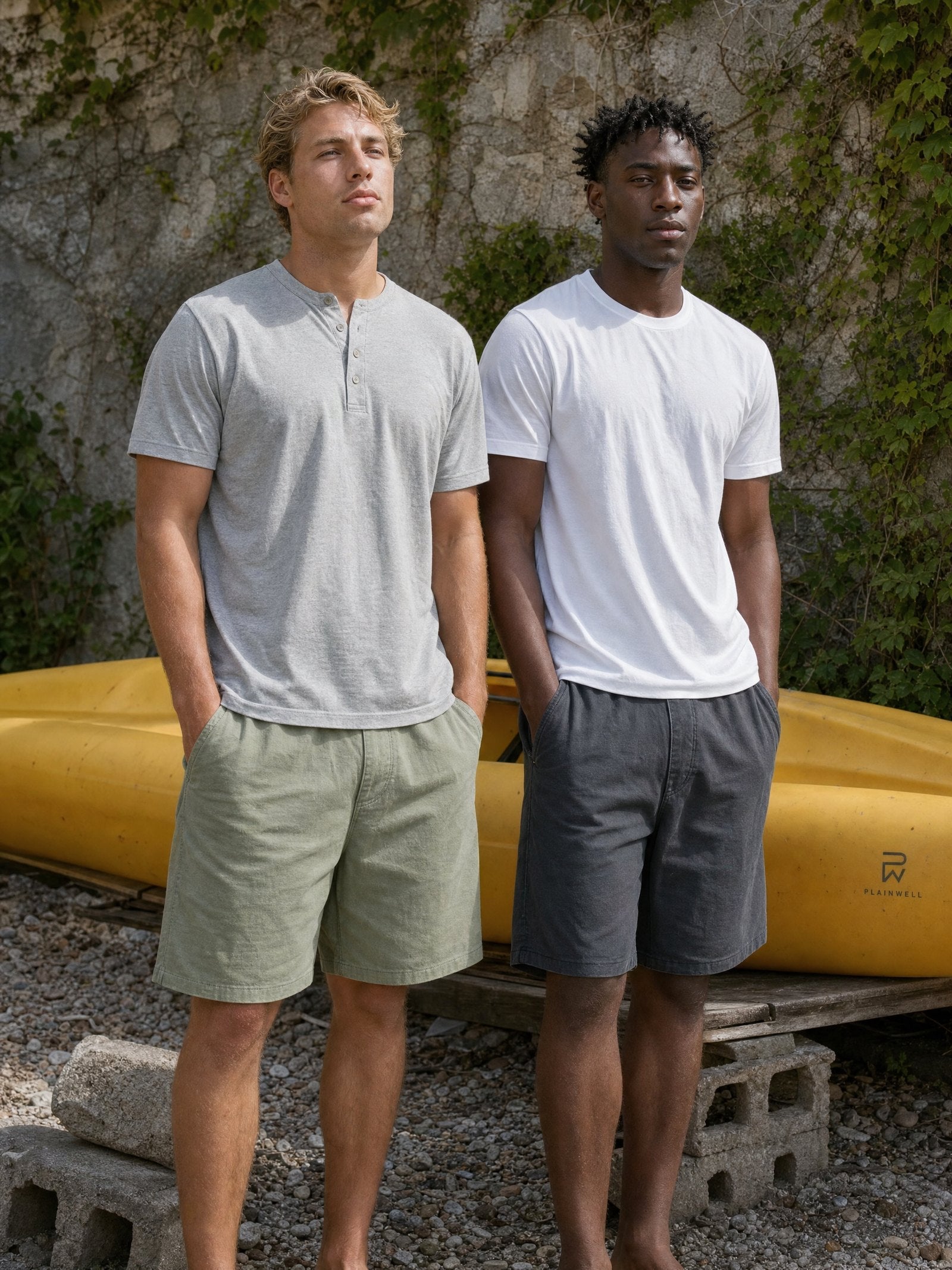 Sage chino short worn with a grey henley by a kayak