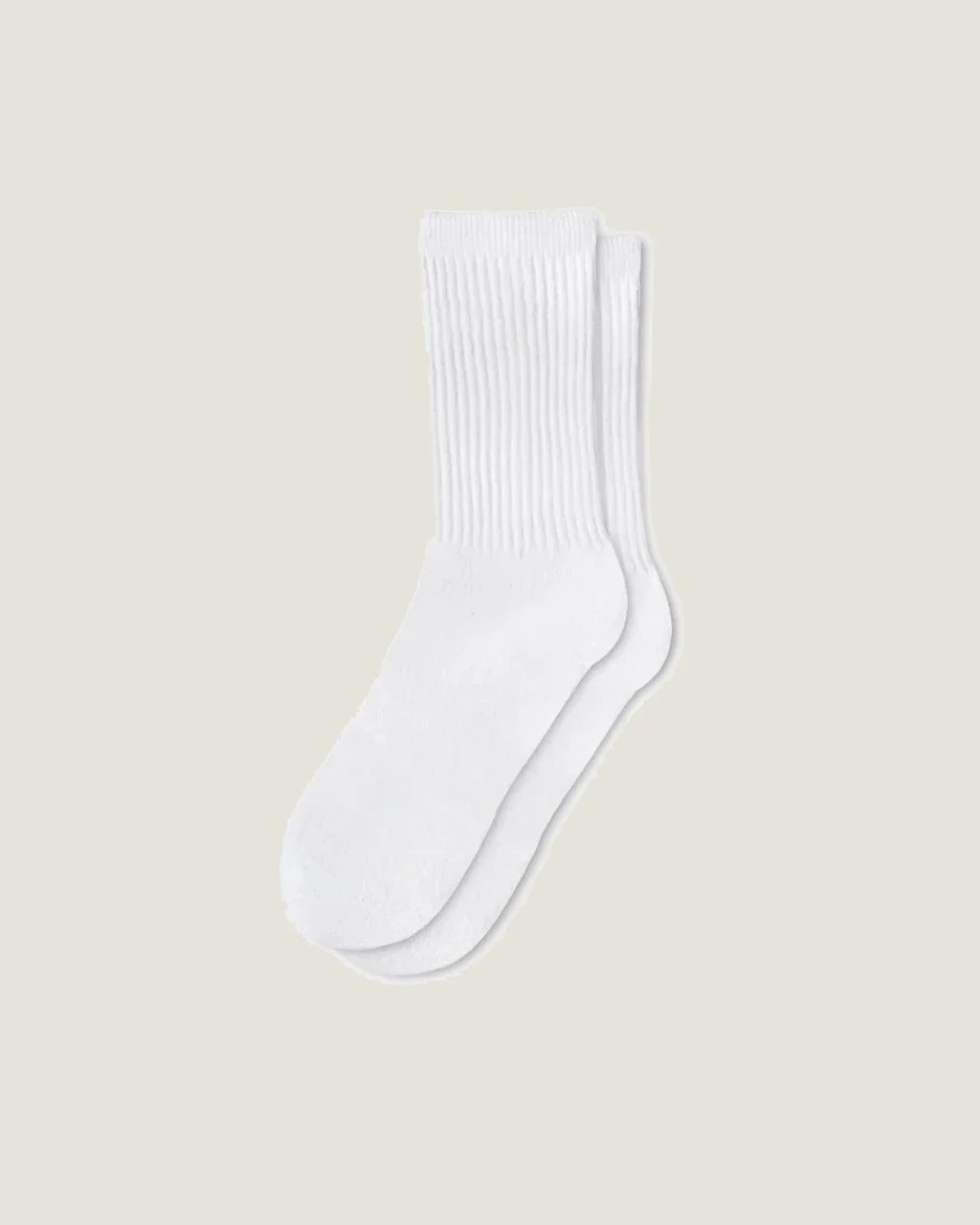 White ribbed crew socks with cushioned sole, pair on white background