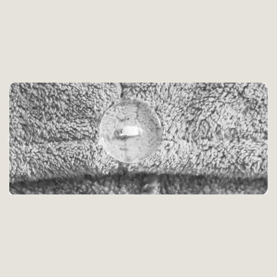 Button and microfiber texture close-up